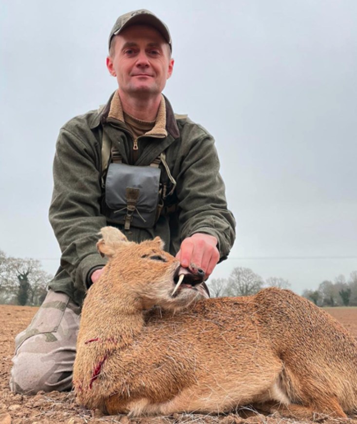 Hunter with a Chinese water deer at Gowthorpe