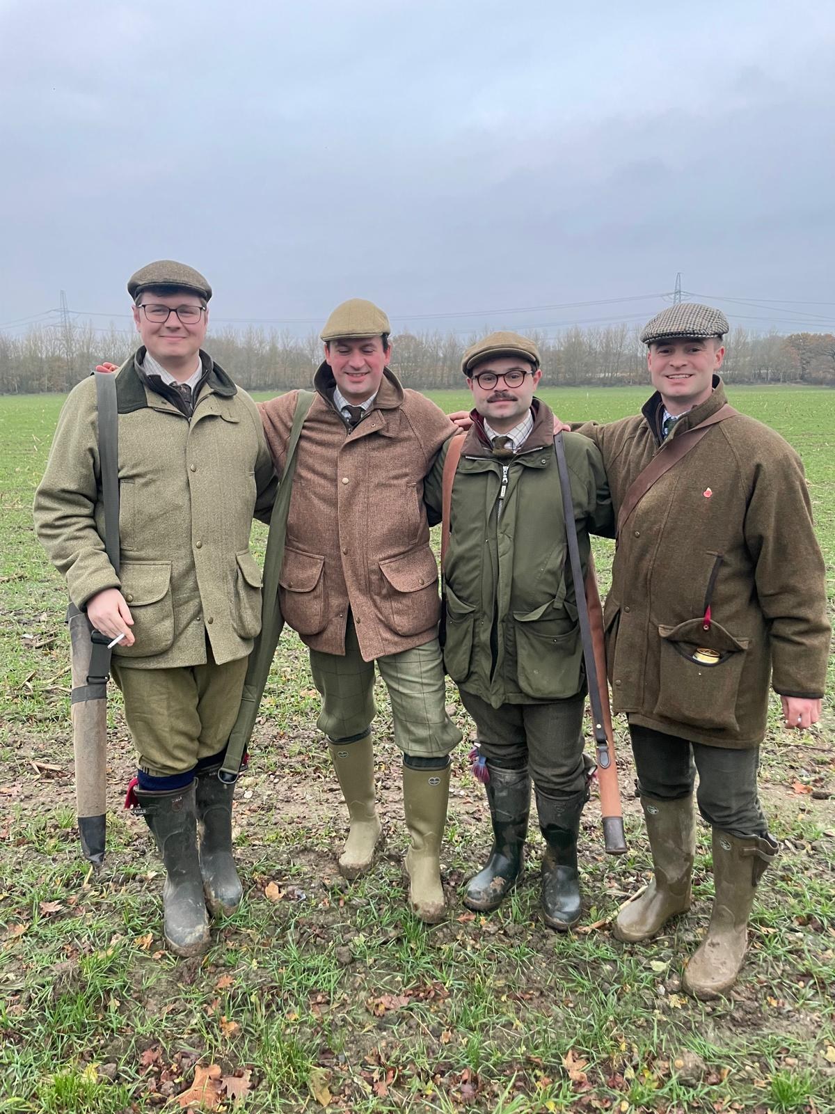 Four guns in tweed shooting attire