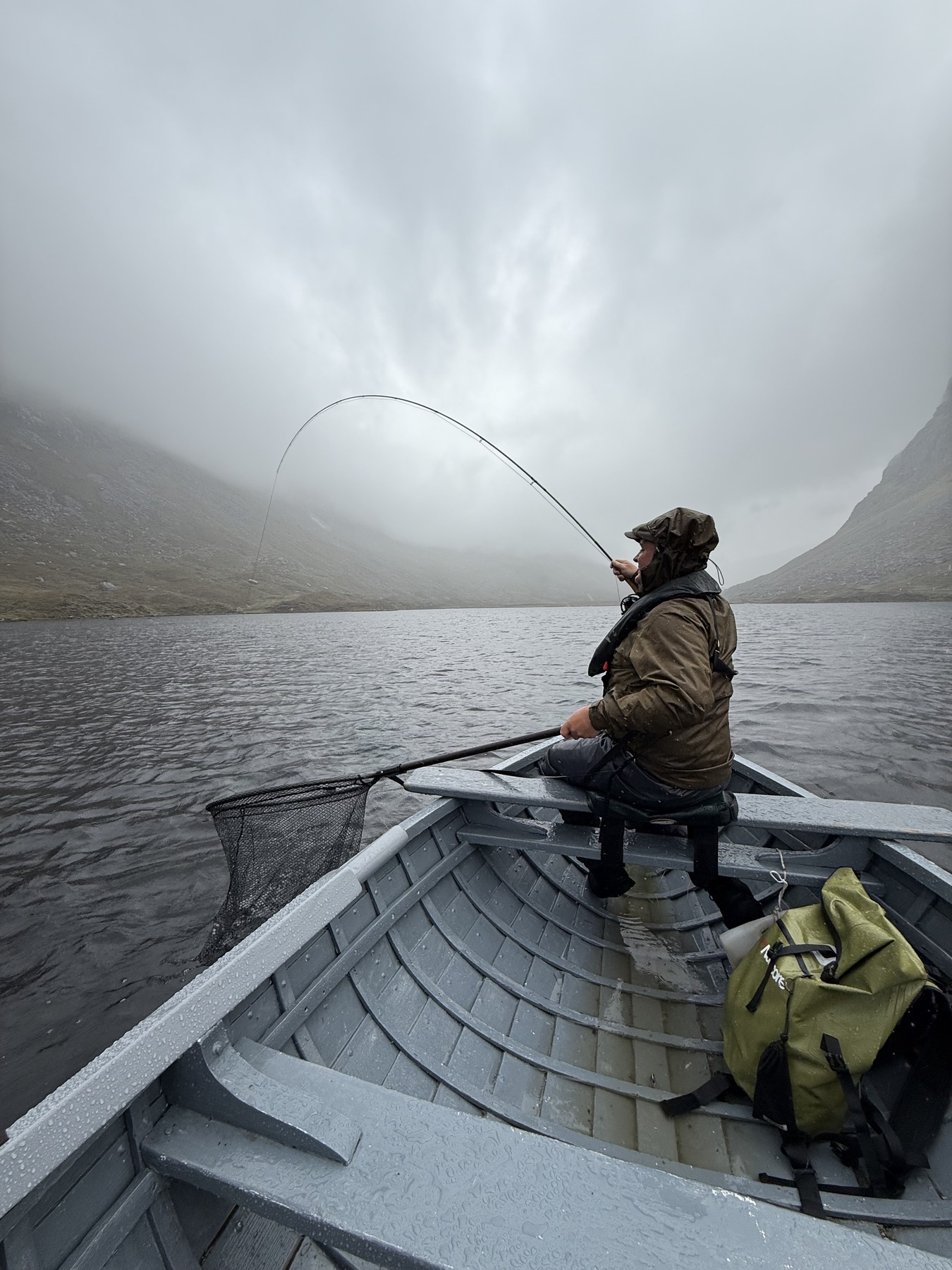 Rod doubled over from a Highland fish