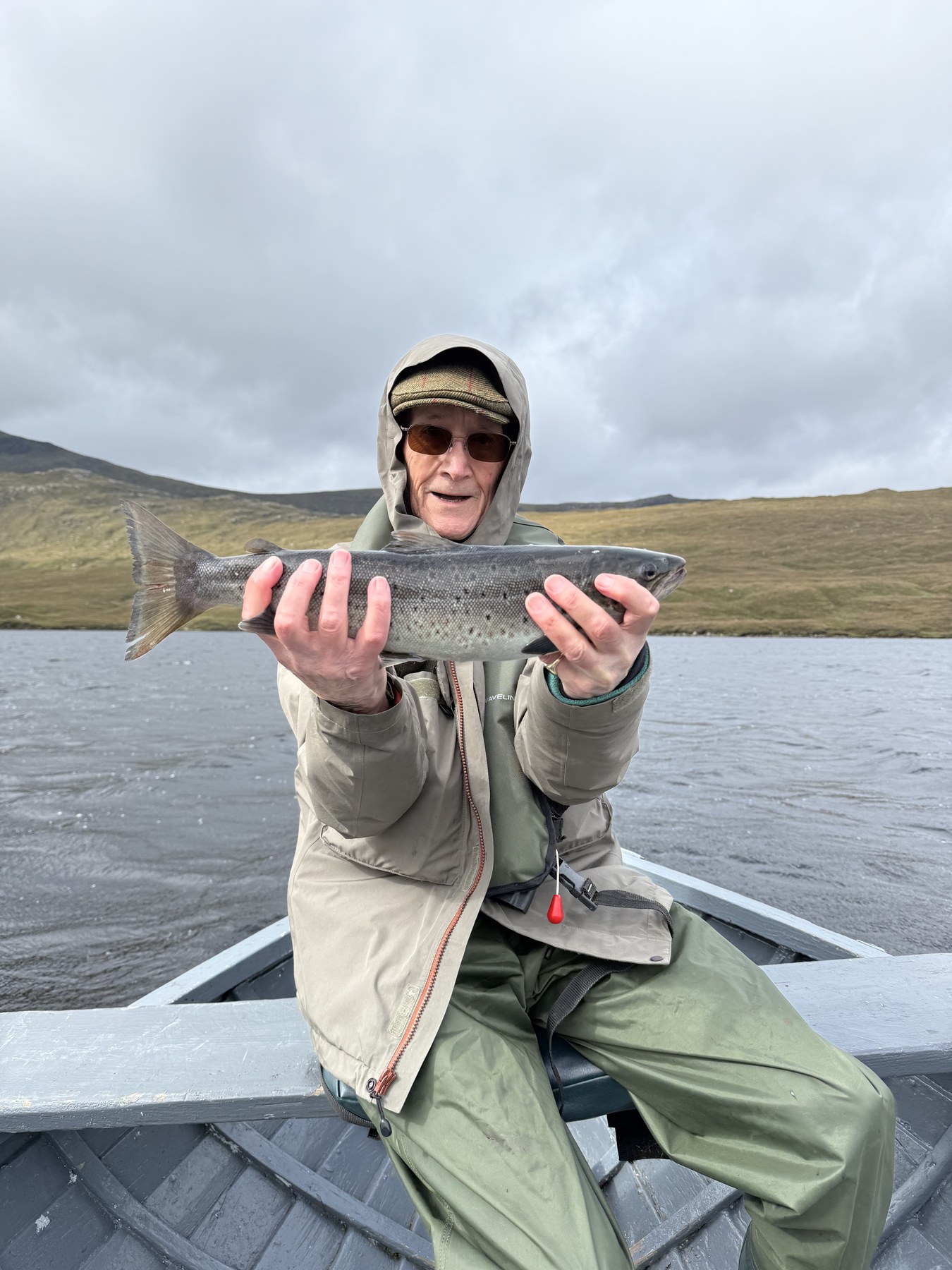 Sutherland angler with a sea trout