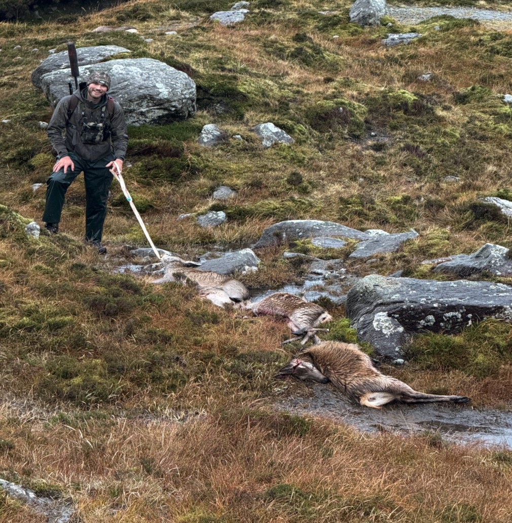 Hunter with three hinds taken in the glen