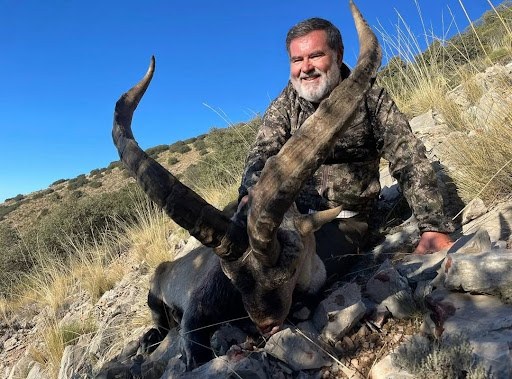 Hunter with a Southeastern Ibex