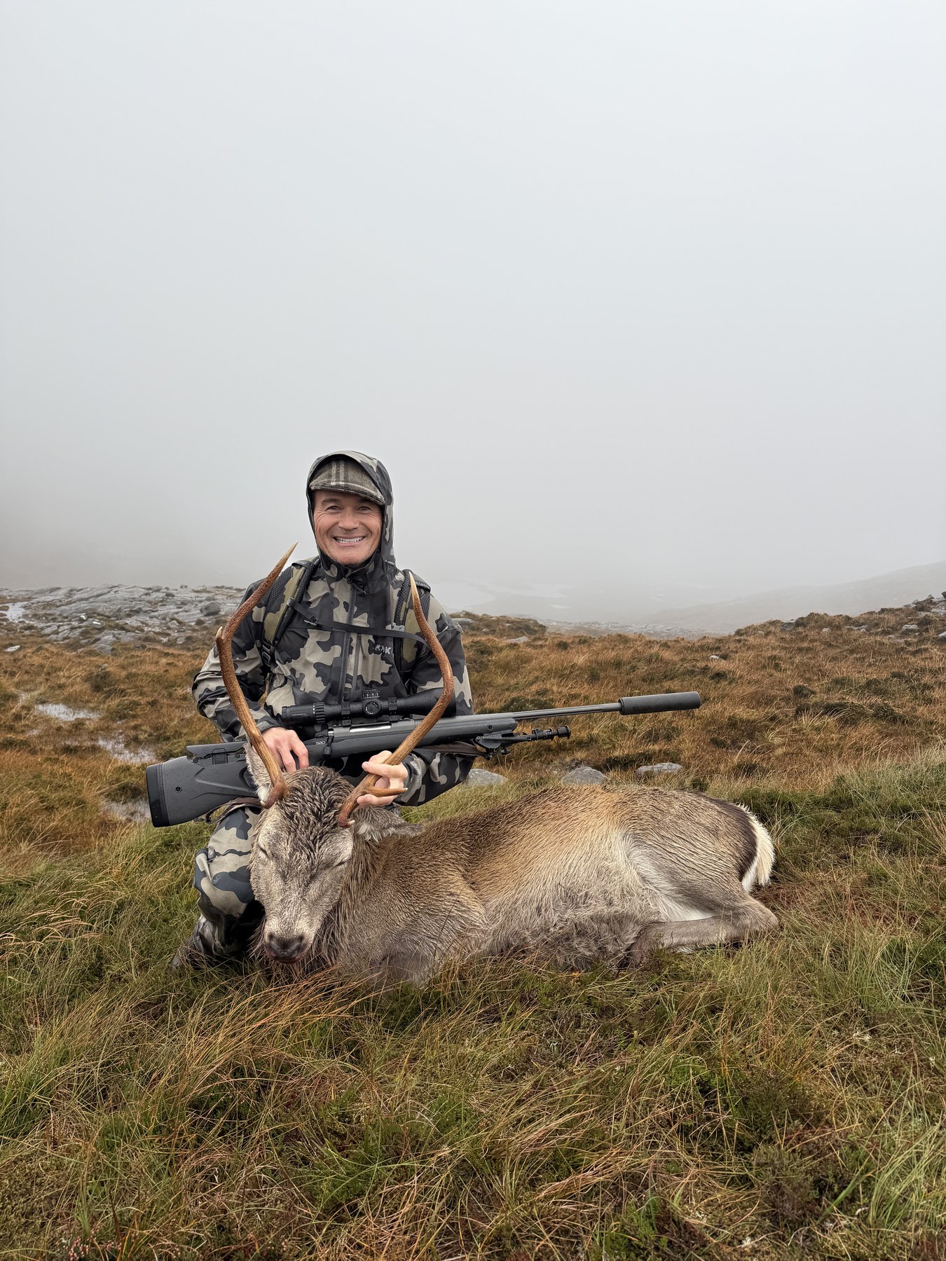 Simon with a Highland red stag at Garvault