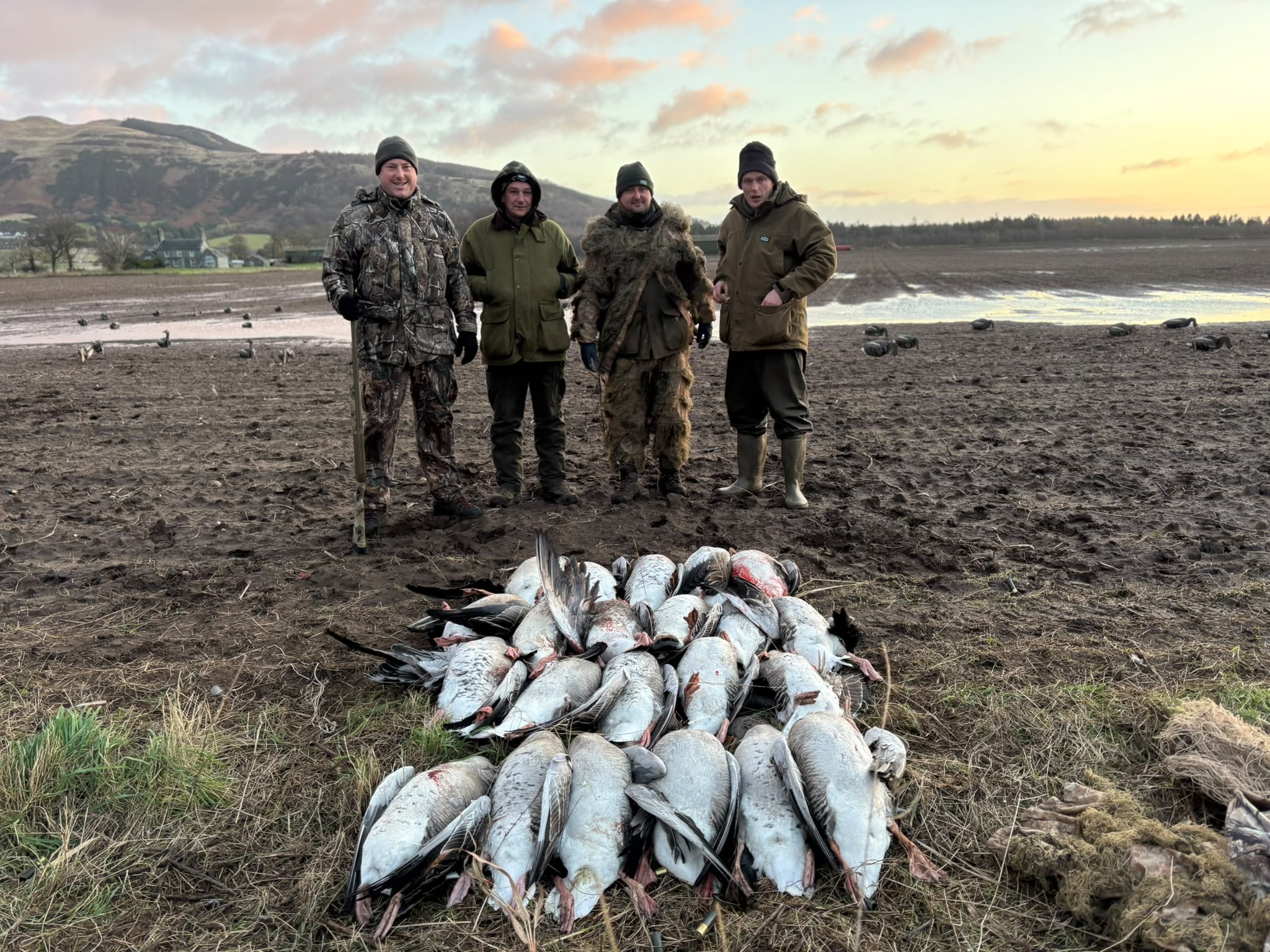 Shooting party at dawn with bag of pink-foot geese